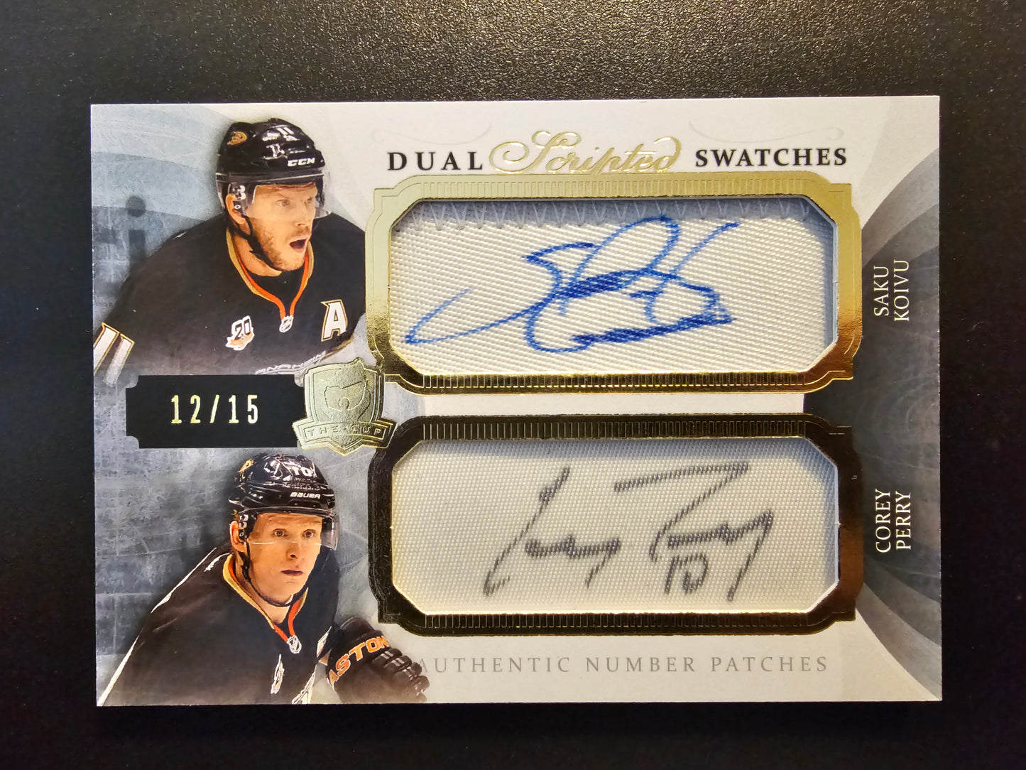 2013-14 Upper Deck The Cup - Dual Scripted Swatches - Saku Koivu / Corey Perry #DSS-KP /15