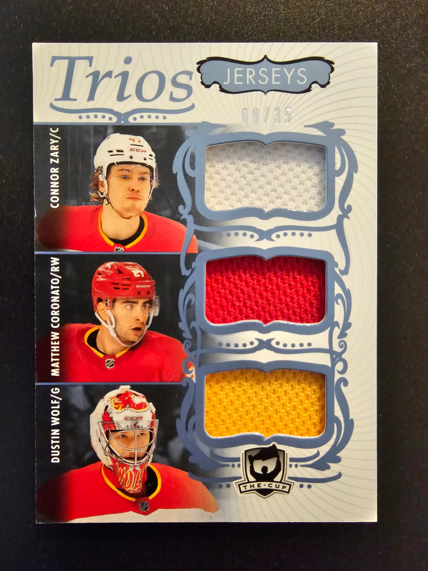 2023-24 Upper Deck The Cup - Jerseys Trios - Connor Zary / Matthew Coronato / Dustin Wolf #C3-WZC /33 RY
