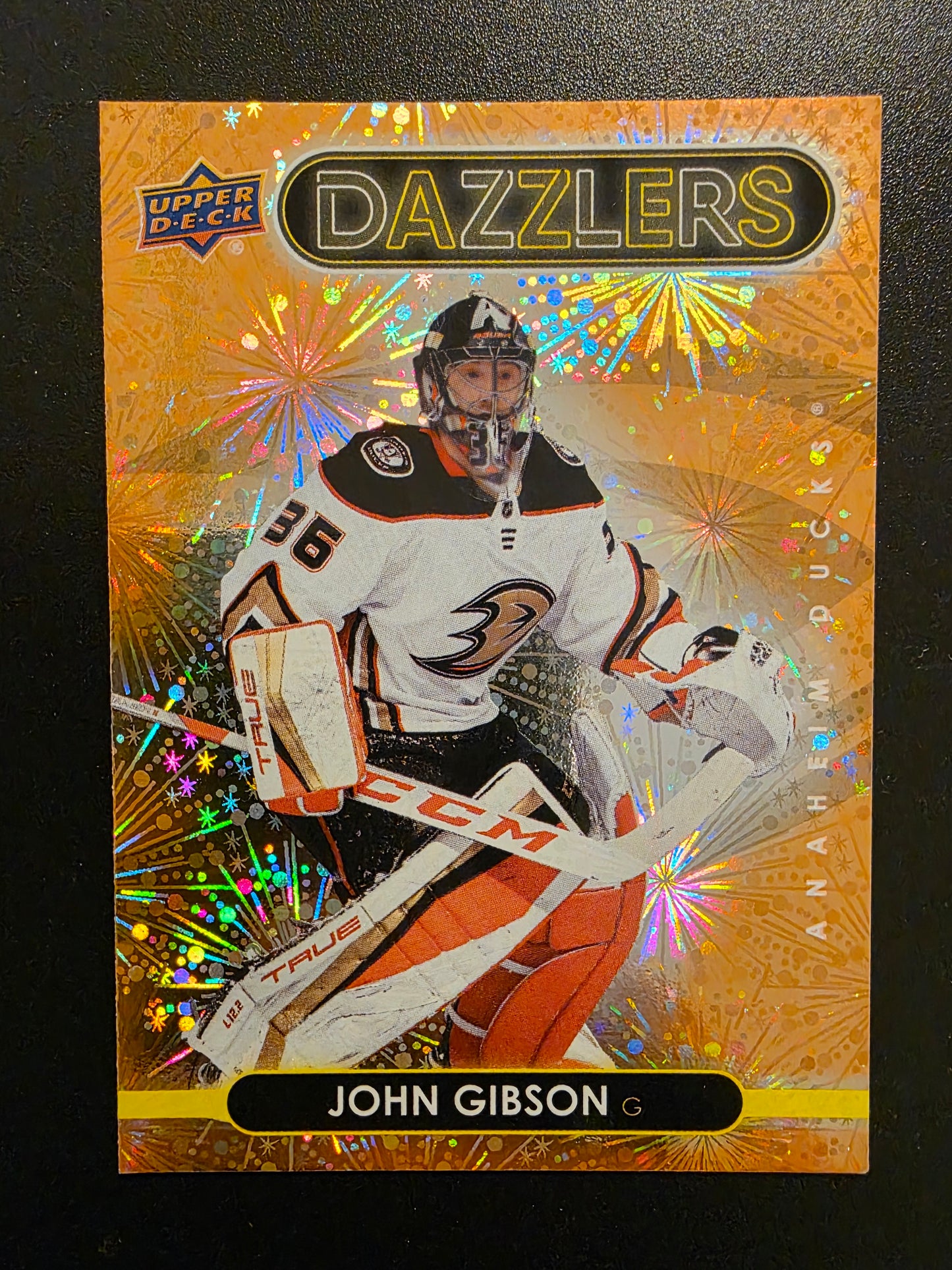 2021-22 Upper Deck Series 2 - Dazzlers - Orange - John Gibson #DZ-52
