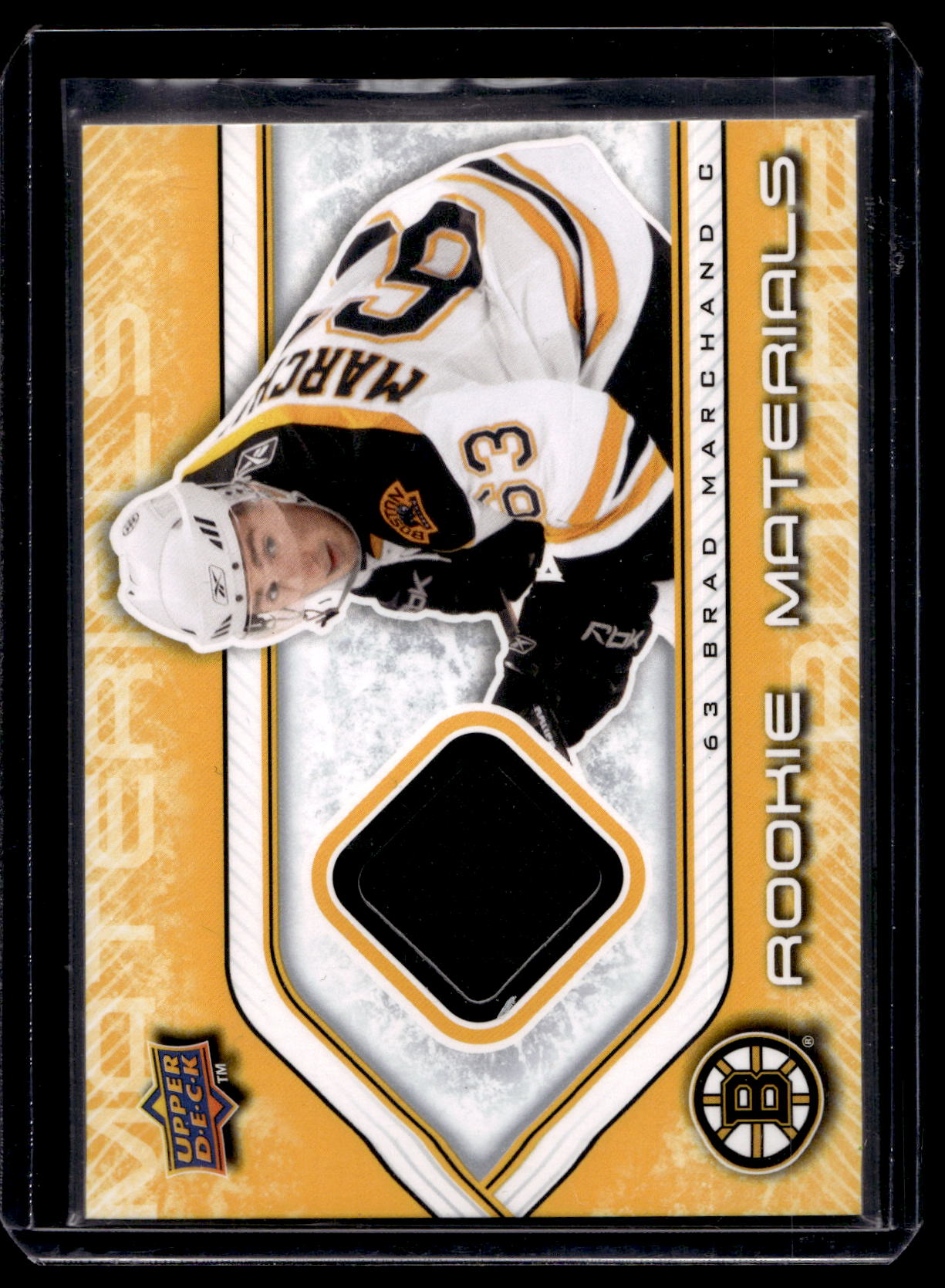 2009-10 Upper Deck - Rookie Materials - Brad Marchand #RM-BM RY