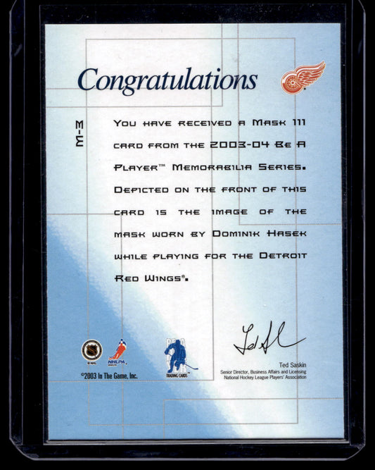 2003-04 In the Game Be A Player Memorabilia - The Mask III - Dominik Hasek #M-3