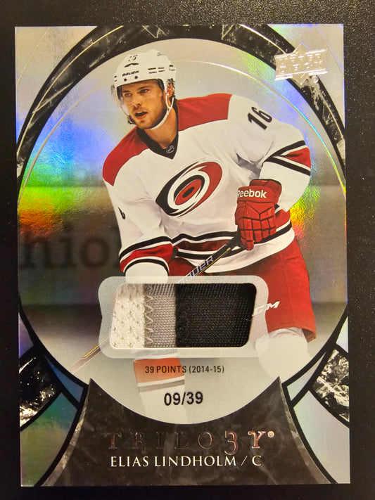 2015-16 Upper Deck Trilogy - Black Rainbow Foil - Season Stats Patch - Elias Lindholm #18 /39