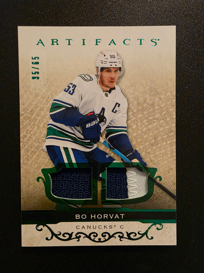 2021-22 Upper Deck Artifacts - Emerald Material Relics - Bo Horvat #1 /65
