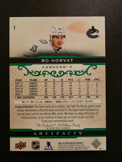 2021-22 Upper Deck Artifacts - Emerald Material Relics - Bo Horvat #1 /65