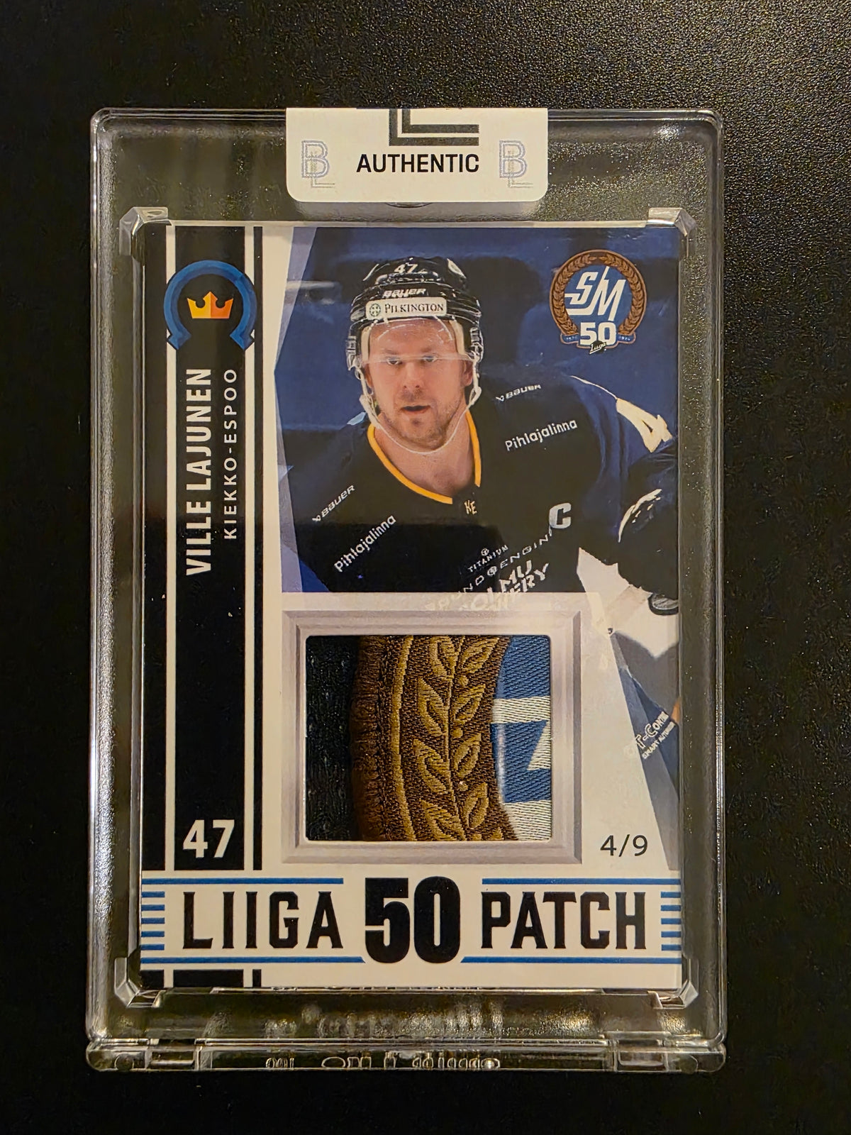 2024-25 Blueline Kiekko-Espoo Team Set Patch - Ville Lajunen #KIEKKO-ESPOO GWP-VL /9