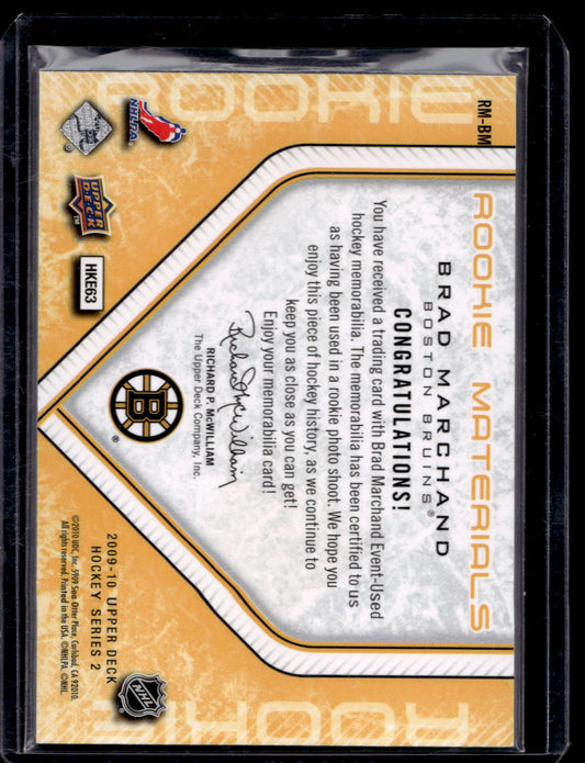 2009-10 Upper Deck - Rookie Materials - Brad Marchand #RM-BM RY