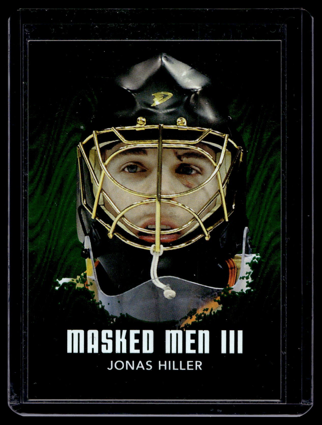 2010-11 In the Game Between the Pipes - Masked Men III - Emerald - Jonas Hiller #MM-27 PR340